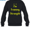 Minu Wearing I'm Training Strength Shirt 1